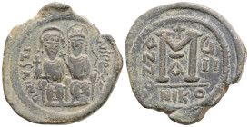 JUSTIN II with SOPHIA (565-578). Follis. Nicomedia. Dated RY 5 (569/70).
Obv: D N IVSTINVS P P AVG.
Justin, holding globus cruciger, and Sophia, hol...