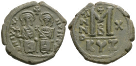 JUSTIN II with SOPHIA (565-578). Follis. Kyzikus. Dated RY 10 (574/5).
Obv: D N IVSTINVS P P AVG.
Justin, holding globus cruciger, and Sophia, holding...