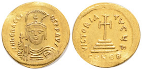 HERACLIUS (610-641). GOLD Solidus. Constantinople.
Obv: d N HERACLIVS P P AVG.
Helmeted, draped and cuirassed bust facing, holding globus cruciger.
Re...