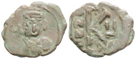 JUSTINIAN II (First reign, 685-695). Half Follis. Constantinople. RY 2 (686/7).
Obv: Crowned bust facing, wearing chlamys and holding globus cruciger....