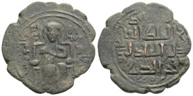 ISLAMIC. Artuquids of Hisn Kayfa and Amid. Fakhr al-din Quara Arslan (539-570 AH/1144-1174 AD). Ae Dirham.
Obv: Christ enthroned facing.
Rev: Arabic (...