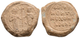 BYZANTINE LEAD SEALS. Uncertain. 
Obv: .
Rev: Legend in four lines.
.
Condition: Good very fine.
Weight: 9.2 g.
Diameter: 21 mm.