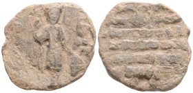 BYZANTINE LEAD SEALS. Uncertain.
Obv: Saint standing facing, holding spear and shield.
Rev: Legend in five lines.
.
Condition: Good fine.
Weight: 17.7...