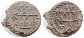 BYZANTINE LEAD SEALS. Anonymous? (Circa 7th century).
Obv: Cruciform invocative monogram: Θεοτοκε βοηθει ; star in each angle; all within wreath.
Rev:...