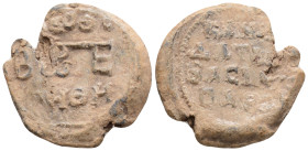 Byzantine Lead Seal (8th Century) Basileus
Obv: Monogram.
Back: 4 (four) lines of text.
Weight: 9.4 Diameter 24