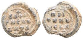 BYZANTINE LEAD SEALS. Uncertain (Circa 8th-9th century)..
Obv: Legend in three lines.
Rev: Legend in three lines.
.
Condition: Very fine.
Weight:...