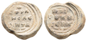 BYZANTINE LEAD SEALS. Uncertain (Circa 8th-9th century)..
Obv: Legend in three lines.
Rev: Legend in three lines.
.
Condition: Very fine.
Weight:...