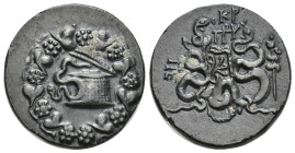 Mysia, Pergamon AR Cistophoric Tetradrachm. (25mm, 12.50 g) Circa 180-133 BC. Cista mystica from which emerges serpent, all within ivy-wreath / Two se...