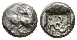 Dynasts of Lycia, Kuprilli AR 1/4 Stater. (12mm, 2.5 g) Circa 480-440 BC. Lion standing right, head left, raising forepaw / Triskeles; KO-ΠP-ΛΛE aroun...