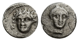 CILICIA. Nagidos. AR Obol (10mm, 0.73 g) (Circa 400-380 BC). Obv: N. Head of Aphrodite facing slightly right. Rev: N. Head of young Dionysos facing sl...