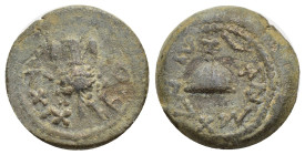 Judaea. First Jewish War. 66-70 C.E. AE 1/8 shekel (18mm, 4.58 g). Jerusalem mint, Dated year 4 = 69/70 C.E.. "Year four," bundle of lulav between two...