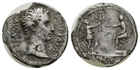 Augustus (27 BC-AD 14). AR denarius (19mm, 3.44 g). Lugdunum, 15 BC. AVGVSTVS-DIVI•F, bare head of Augustus right / IMP•X, Augustus seated left on cur...
