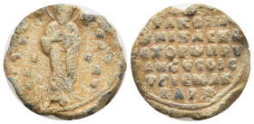 Basileios, parakoimomenos (doux of Edessa), 1060-1090. Seal (Lead, 23mm, 11.66 g). O / A/ΓI/O - R/A/CI/Λ Saint Basil, standing facing, nimbate, raisin...