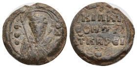Lead Seal (11th Century) Obv: Saint bust, holding spear in right hand, halo. Back: Legend in three lines. 19mm, 8.47 gr.