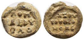 Lead Seal Obv: Legends in three lines. Rev: Legends in three lines. 19mm, 8.56 gr.