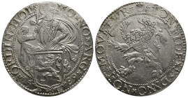 Netherlands AR Lion Taler. (39mm, 27.12 g) Holland, 1589. MO NO ARG ORDIN HOL, Knight over lion shield / CONFIDENS DNO NON MOVETVR, Rampant lion left.