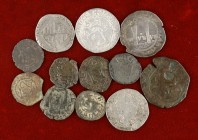 Juana y Carlos. Lote de 12 monedas, cuatro en plata (1 real), todas diferentes. A examinar. BC/BC+.