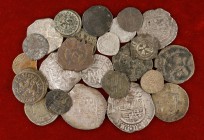 Felipe II. Lote de 24 monedas, nueve en plata: (1/2 (tres), 1 (tres) y 2 reales (tres), todas diferentes. A examinar. BC-/MBC-.