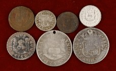 Fernando VI. Lote de 7 monedas, cinco en plata tipo columnario: (1/2 (dos), 1 y 2 reales (dos), dos con perforación , todas diferentes. A examinar. BC...
