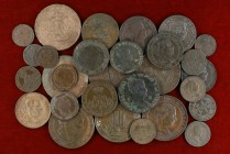 Isabel II. Lote de 29 monedas en cobre, casi todas diferentes. A examinar. BC-/MBC-.