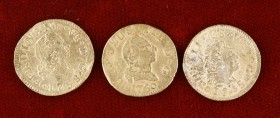 1745, 1758 y 1760. Madrid y Sevilla. Lote de 3 monedas de 1/2 escudo con restos de soldadura. (BC).