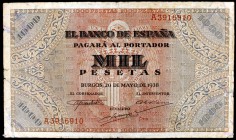 1938. Burgos. 1000 pesetas. (Ed. D35). 20 de mayo. Pequeñas roturas. Raro. BC+.