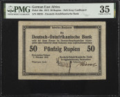 GERMAN EAST AFRICA. Deutsch-Ostafrikanische Bank. 50 Rupien, 1915. P-46a. PMG Choice Very Fine 35.
Soft gray cardboard. An elusive WWI era German col...