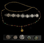 MIXED LOTS. Group of Ancient Coin Jewelry (8 Pieces).
A mixture of various items of jewelry containing ancient coins, mostly Roman Denarii. A bracele...