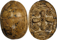 Egyptian Steatite Scarab. New Kingdom, ca. 1550-1069 B.C. 7.66 gms. VERY FINE.
Diameter: 27mm. With a light brown mottled glaze, incised with a cross...