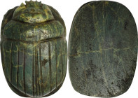 Egyptian Green Stone Heart Scarab. Probably Third Intermediate Period, ca. 1069-664 B.C. 13.67 gms. VERY FINE.
Diameter: 30mm. Uninscribed. SOLD AS I...