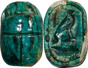 Egyptian Steatite Scarab. Third Intermediate Period, 22nd Dynasty, ca. 945-715 B.C. 1.43 gms. VERY FINE.
Diameter: 16mm. With a bright green glaze, i...