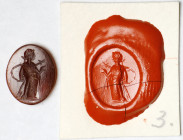 Roman Dark Red Carnelian Intaglio. ca. 1st - 2nd Century A.D. VERY FINE.
Dimensions: 10 x 8 gms. Incised with the figure of Salus, wearing a chiton a...