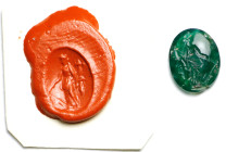 Roman Emerald Intaglio. 1st - 2nd Century A.D. 1.04 gms. FINE.
Dimensions: 8 x 7mm. Incised with a figure of Fortuna standing right, holding a rudder...