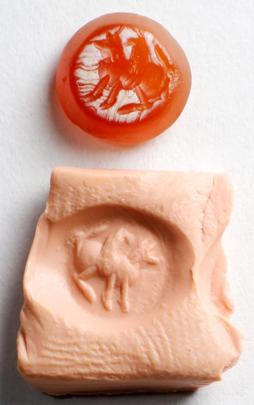 Sassanian Reddish Orange Carnelian Intaglio. ca. 5th Century A.D. 0.34 gms. FINE...