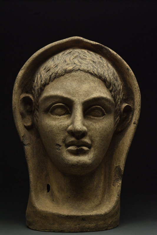 ETRUSCAN TERRACOTTA VOTIVE YOUTH HEAD - TL TESTED
Ca. 400-200 BC. 
A terracott...