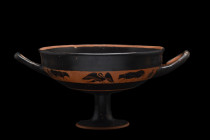 ATTIC BLACK-FIGURE BAND KYLIX WITH BIRDS AND COWS