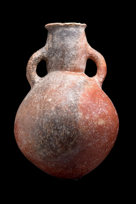 LARGE CYPRIOT BRONZE AGE TERRACOTTA AMPHORA
Ca. 2300-1650 BC. 
An attractive r...