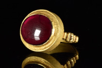 ANCIENT GREEK GOLD ARCHITECTURAL RING WITH GARNET