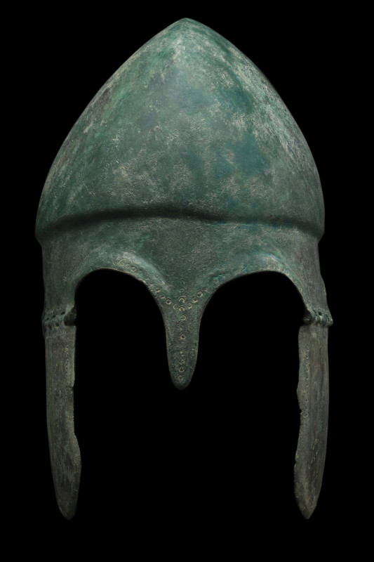 GREEK BRONZE CHALCIDIAN HELMET
Ca. 500-300 BC. 
A superb Chalcidian helmet. Th...
