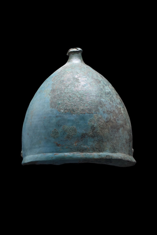 ROMAN BUGGENUM TYPE BRONZE HELMET
Ca. 100-50 BC. 
A Buggenum type bronze helme...