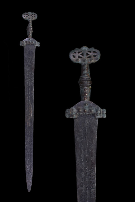 VERY RARE TYPE OF CELTIC IRON SWORD WITH BRONZE HANDLE
Ca. 800-500 BC. 
Straig...