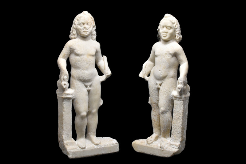ROMAN MARBLE HARPOCRATES PAIR
Ca. 200-300 AD. 
Provenance: From a private Fren...