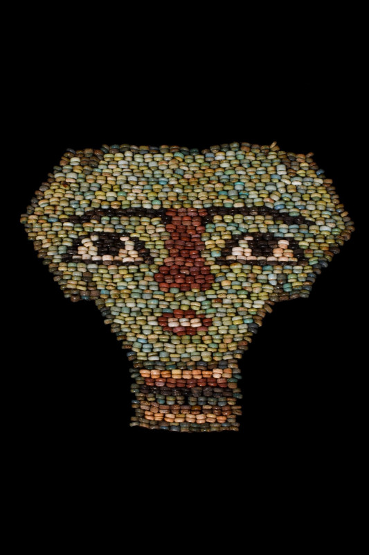 ANCIENT EGYPTIAN FAIENCE BEADED MUMMY MASK
Late Period, Ca. 663-323 BC. 
An an...