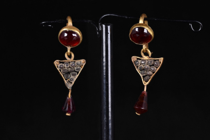 ROMAN MATCHED PAIR OF GOLD EARRINGS
Ca. 100-300 AD. 
22K Gold Earrings. Openwo...