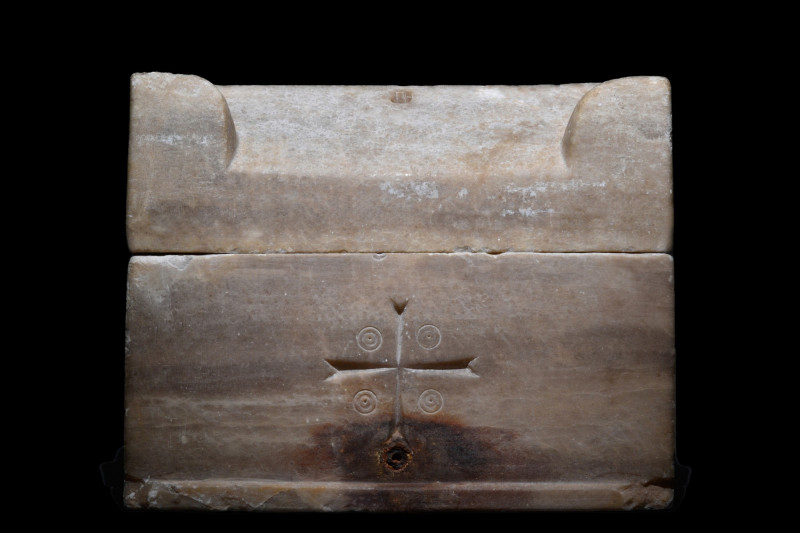 BYZANATINE MARBLE RELIQUARY BOX WITH CROSS - PUBLISHED
Ca. 400-600 AD. 
A two-...