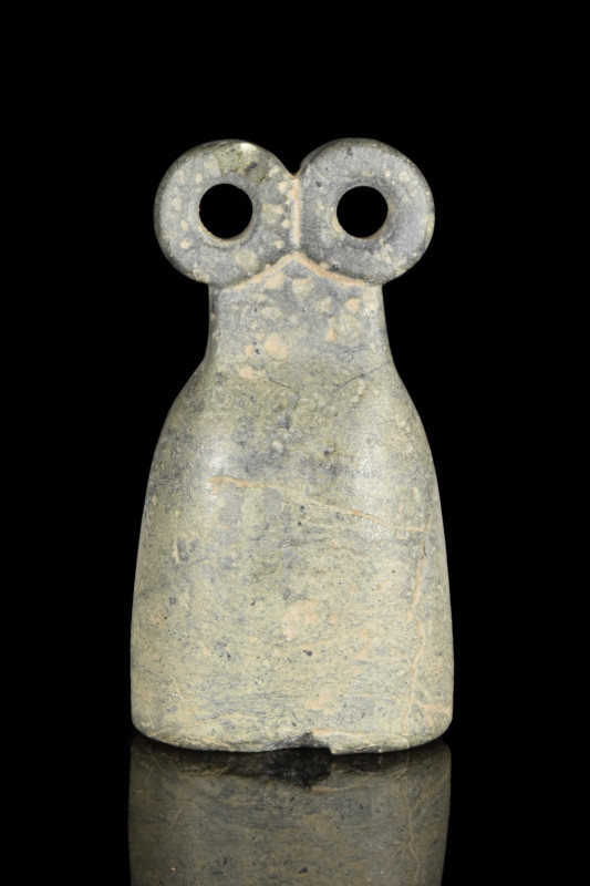 WESTERN ASIATIC STONE EYED IDOL
Ca. 3700-3500 BC. 
An attractive grey-coloured...