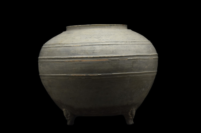 CHINESE HAN DYNASTY GREY POTTERY JAR
Ca. 202 BC - 220 AD. 
A globular shaped v...