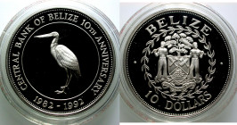 Belize. 
10 Dollar 1992 Central Bank of Belize 10th Anniversary. Jabiru stork. 37 mm; 28.28 g. KM&nbsp;104. . 

Proof