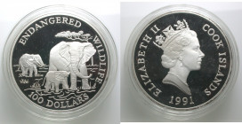 Cook Islands. 
ENDANGERED WILDLIFE. 100 Dollar 1991. Three elephants. 155,6 g = 5 ounces. KM&nbsp;297. Im Etui.. 

Proof