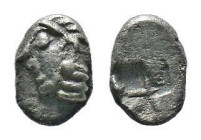 (Silver, 0.17g 4mm)Ionia, Phokaia, c. 521-478 BC. AR Obol. Female head l., wearing helmet or close fitting cap. R/ Quadripartite incuse square.